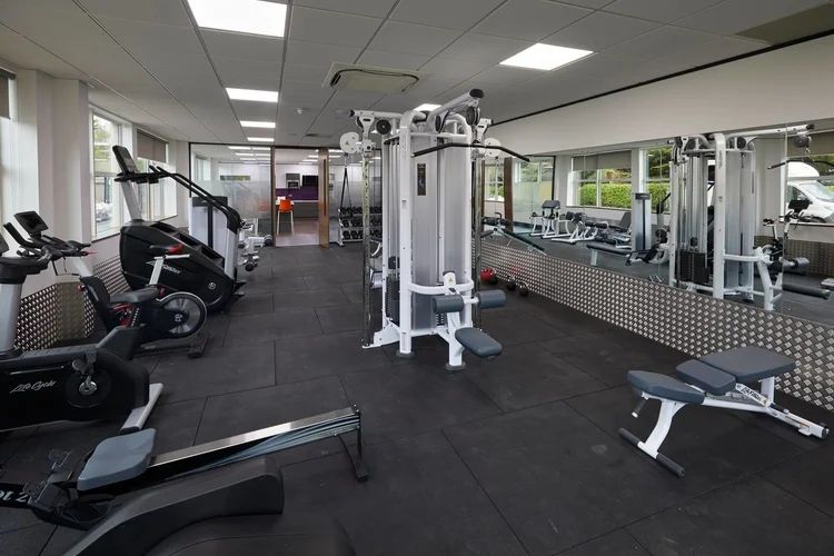 Imperial House | Foursquare Workspace Modern gym with various exercise equipment.