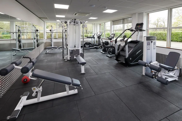 Imperial House | Foursquare Workspace Modern gym with various equipment.